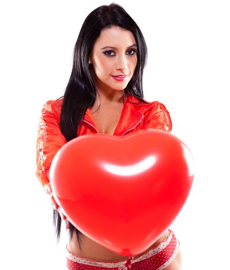 Sexy woman holding a heart shaped balloon for Valentines Day