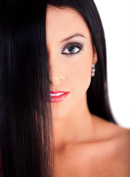 Woman with beautiful healthy black hair - isolated over a white background