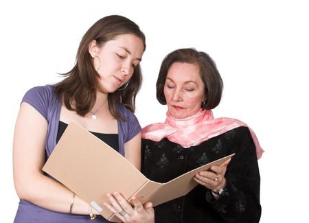 business women with folder discussing notes - white background