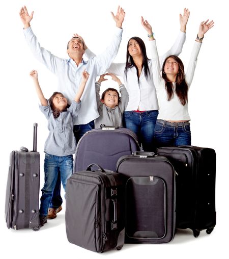 Family with luggage excited about a trip - isolated over a white background
