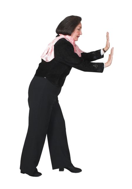 business woman pushing something aside over a white background