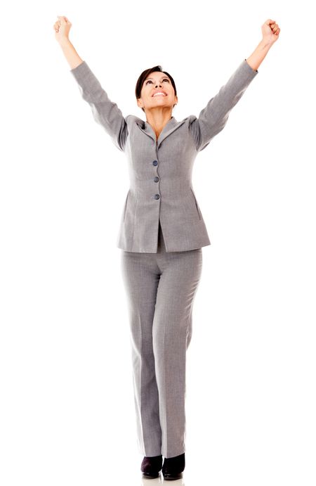 Successful businesswoman with arms up - isolated over a white background