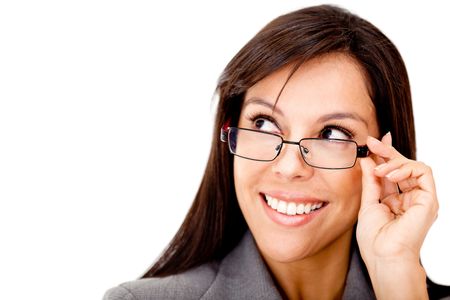 Clever business woman with glasses looking to the side - isolated over a white background