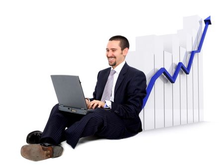 business man on a laptop sitting on the floor with a growth and success chart
