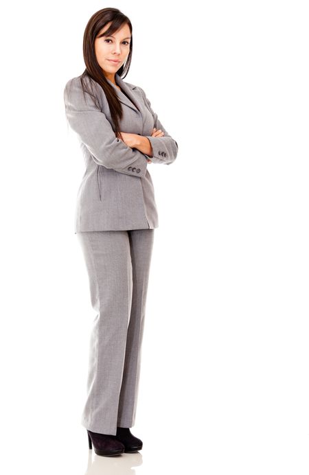 Confident business woman with arms crossed - isolated over a white background