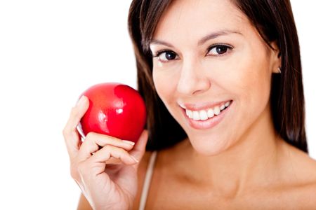 Healthy eating woman holding a red apple - isolated over a white background
