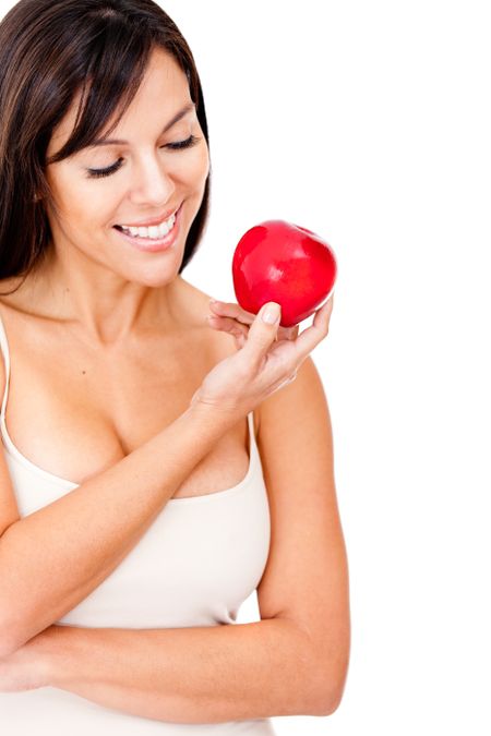 Healthy eating woman holding an apple - isolated over a white background