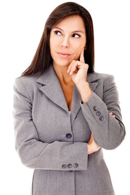 Pensive businesswoman looking up - isolated over a white background