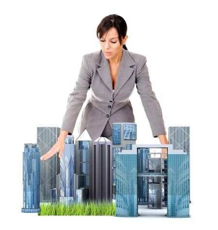 Female architect with a model - isolated over a white background