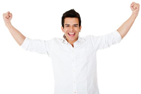 Happy man with arms up and smiling - isolated over a white background