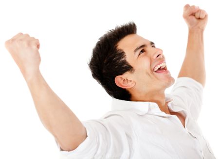 Happy man with arms up and smiling - isolated over a white background