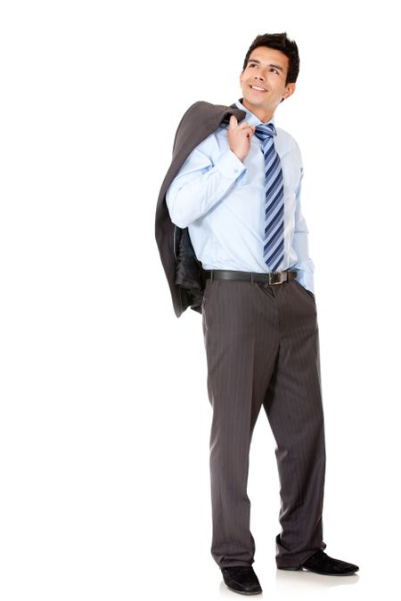 Thoughtful businessman standing isolated over a white background