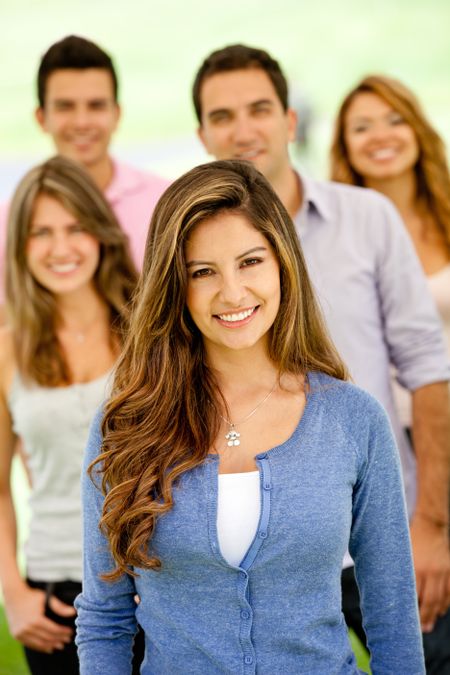 Group of casual young people looking happy