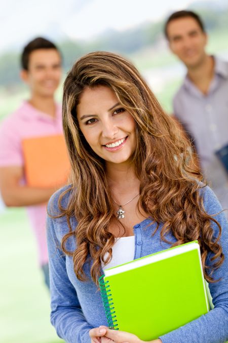 Friendly female student looking happy and smiling