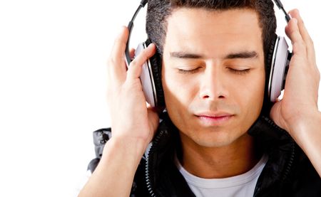 Man listening to music and relaxing - isolated over a white background
