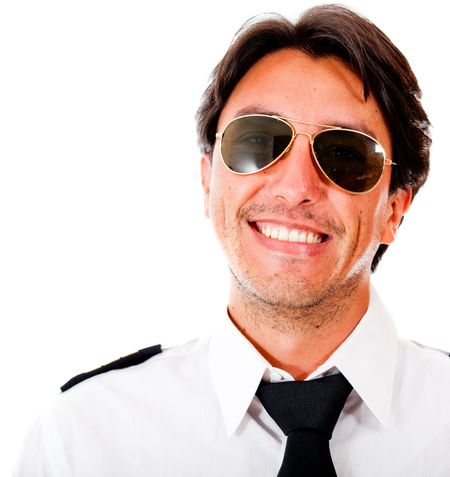 Handsome male pilot smiling - isolated over a white background