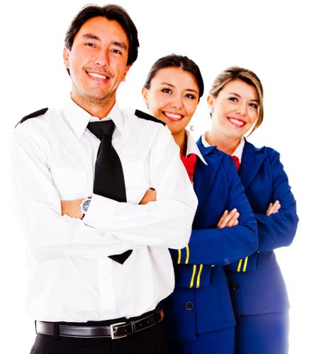 Friendly cabin crew smiling Ã?Â¢?? isolated over a white background