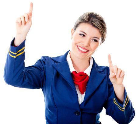 Flight attendant touching an imaginary screen with her fingers