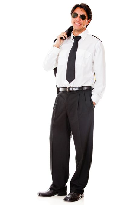Confident male pilot in uniform - isolated over a white background
