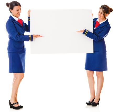 Flight attendants holding a banner ad Ã?Â¢?? isolated over a white background
