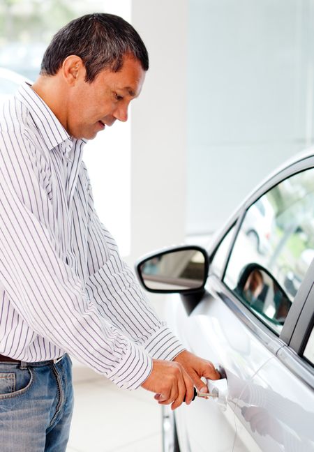 Man opening a car with his key