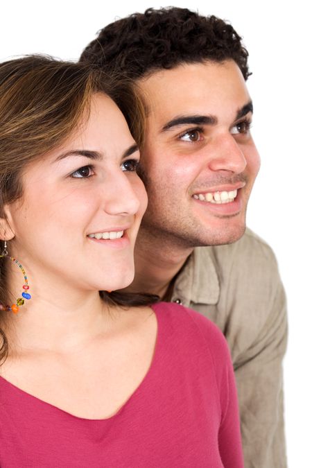 happy couple of young adults portrait smiling isolated over a white background