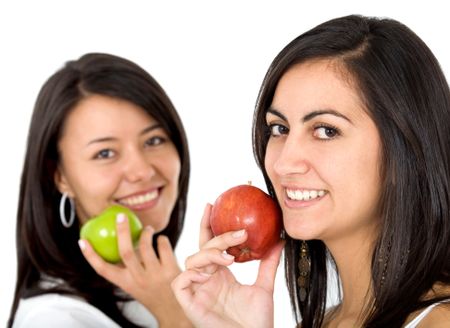 casual women with apples isolated over a white background