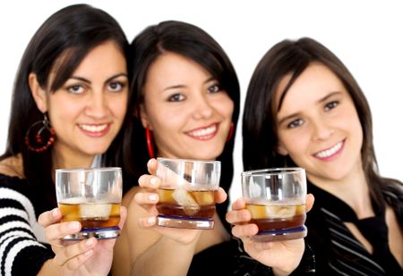 friends at a party drinking whiskey - isolated over a white background