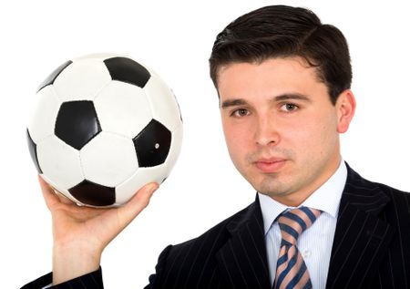 business man holding a football isolated over a white background