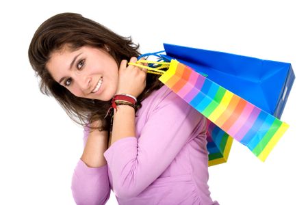 woman smiling with shopping bags isolated over a white background
