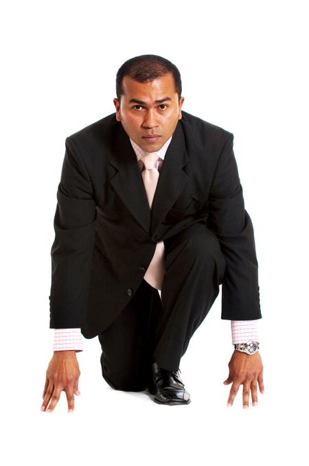 business man ready to race isolated over a white background
