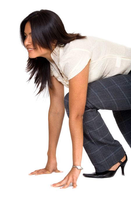 business woman ready to race isolated over a white background