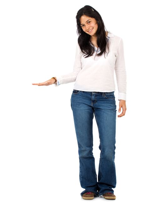 casual woman displaying something next to her isolated over a white background