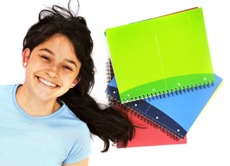 college student smiling with some notebooks - isolated over a white background