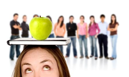 teacher with an apple in front of many students - isolated over a white background