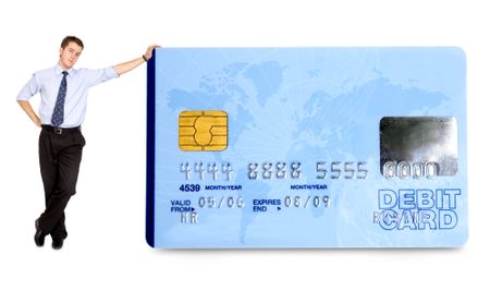 business man holding a credit card over a white background - note the design of the card is my own and the numbers on the card are made up
