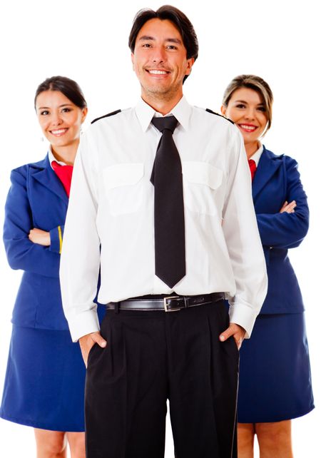 Airplane cabin crew with pilot and air hostesses - isolated over white