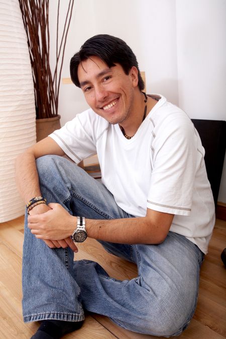 casual man lifestyle portrait smiling in his home