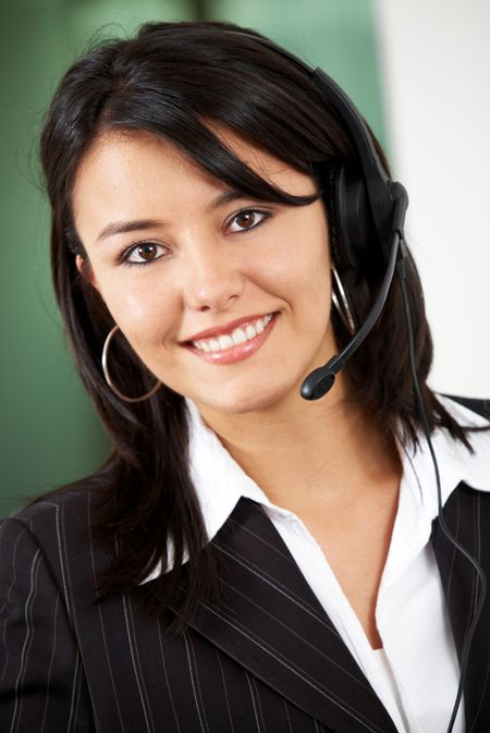 friendly customer service woman smiling at her office