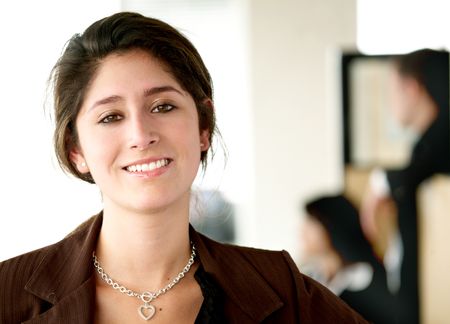 business woman portrait smiling in an office