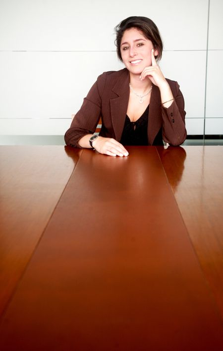 Business woman portrait smiling in an office