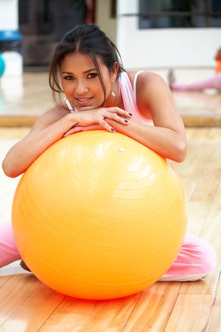 girl-doing-pilates-gym-white-background-9791302 girl doing pilates at the gym - over a white background