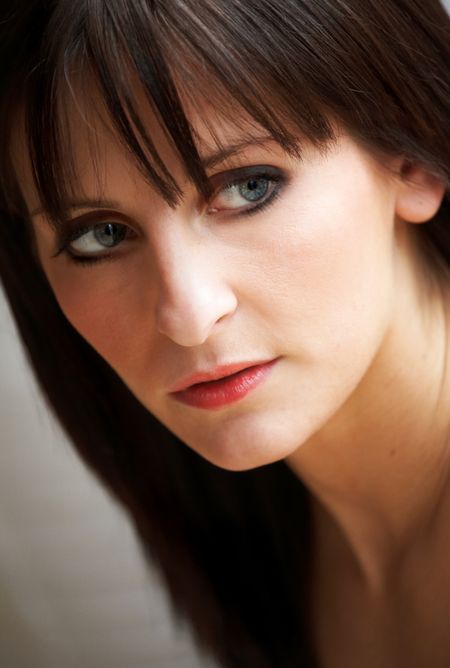 Casual woman portrait looking deep in thought