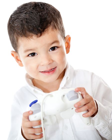 Boy playing videogames with a remote control - isolated over a white background