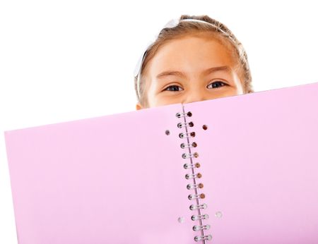 Primary school girl holding notebook - isolated over a white background