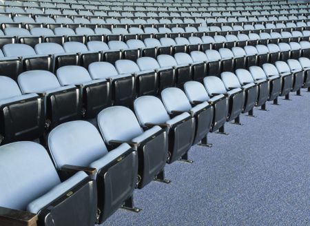 Symmetry in seating for a small crowd: Rows of folding seats in auditorium