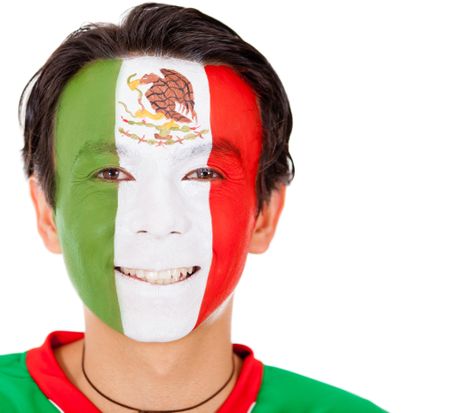 Portrait of a man with the Mexican flag painted on his face