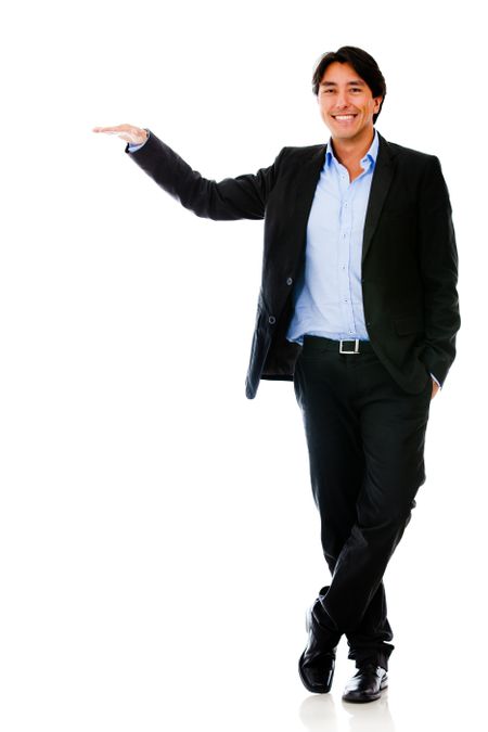 Business man with arm extended - isolated over a white background