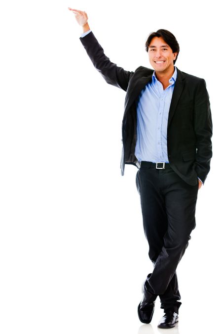 Business man with hand on a tall imaginary object - isolated over white