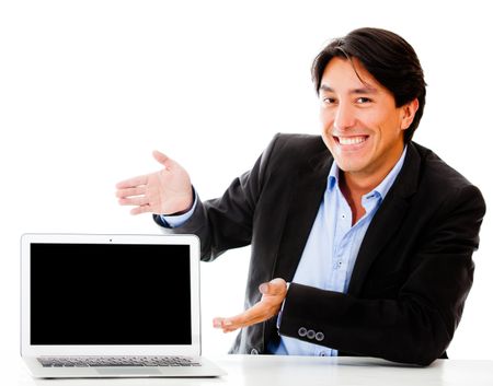 Business man displaying something in a laptop - isolated over a white background